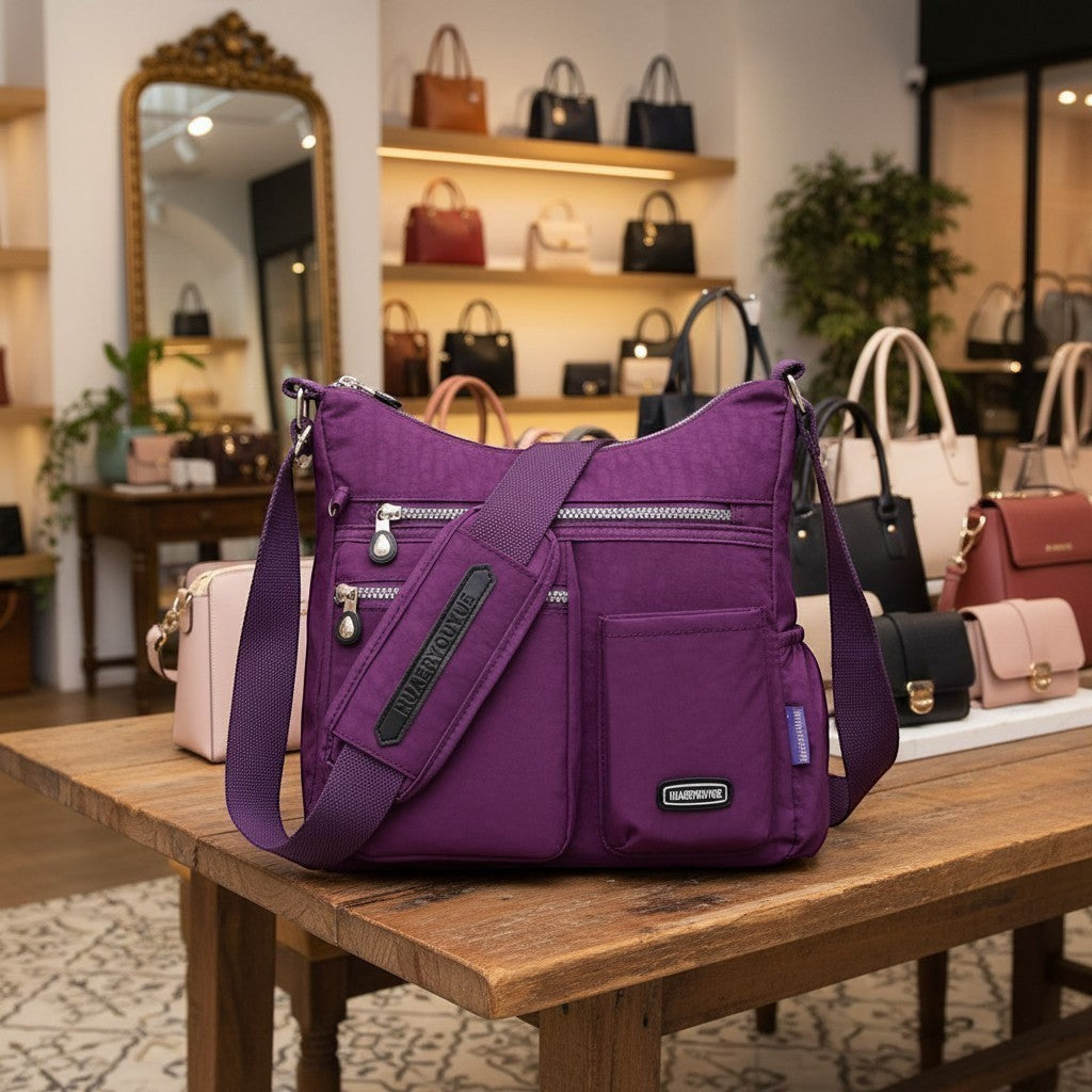 ZenZon Nordic purple nylon crossbody bag with multiple zippered pockets and adjustable strap in a boutique setting